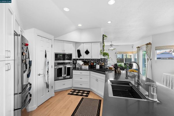 Interior, Kitchen, Recessed Lighting, Stainless Steel Appliances, Wood Texture Flooring
