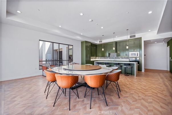 Dining room, Interior, Kitchen, Pendant Lights, Recessed Lighting, Stainless Steel Appliances, Wood Texture Flooring
