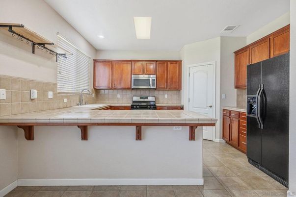 Interior, Kitchen, Recessed Lighting, Tile Countertops