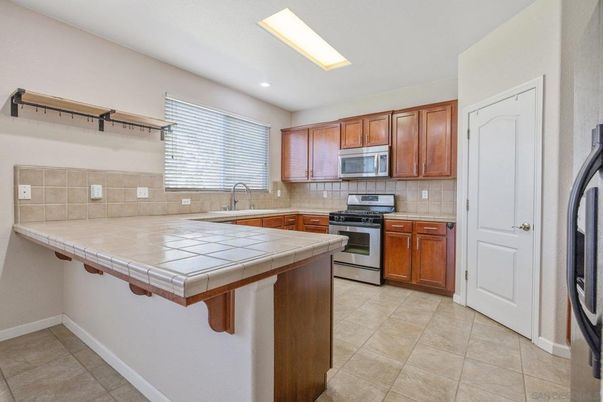 Interior, Kitchen, Recessed Lighting, Tile Countertops