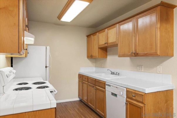 Interior, Kitchen, Tile Countertops, Wood Texture Flooring