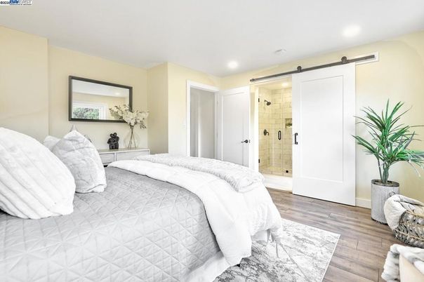 Bathroom, Bedroom, Glass Shower, Interior, Recessed Lighting, Wood Texture Flooring