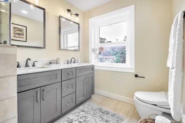 Bathroom, Dual Sink Vanities, Interior, Recessed Lighting, Wood Texture Flooring