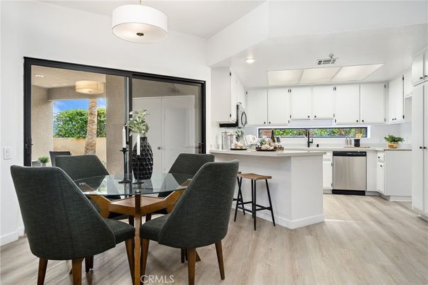 Dining room, Interior, Kitchen, Pendant Lights, Recessed Lighting, Stainless Steel Appliances, Wood Texture Flooring