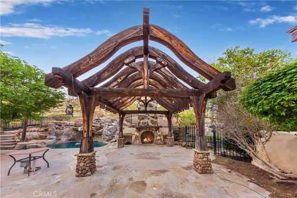 Exterior, Fireplace, Pool