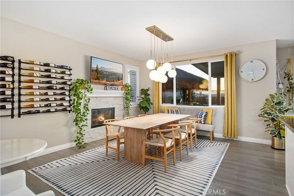 Dining room, Fireplace, Interior, Pendant Lights, Wood Texture Flooring