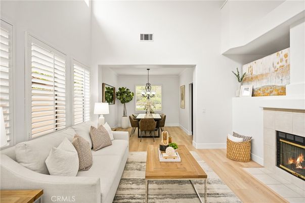 Chandelier, Dining room, Fireplace, Interior, Living room, Pendant Lights, Wood Texture Flooring