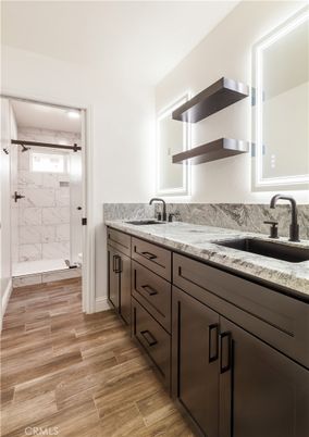 Bathroom, Glass Shower, Interior, Marble Walls, Wood Texture Flooring