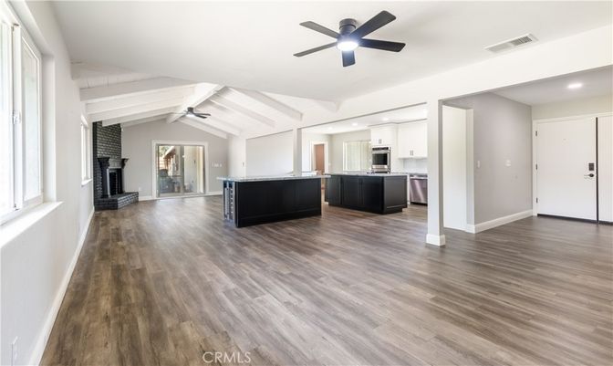 Fireplace, Interior, Kitchen, Recessed Lighting, Stainless Steel Appliances, Wood Texture Flooring