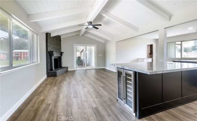Fireplace, Interior, Recessed Lighting, Stone Walls, Wood Texture Flooring
