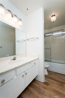 Bathroom, Dual Sink Vanities, Glass Shower, Interior, Wood Texture Flooring
