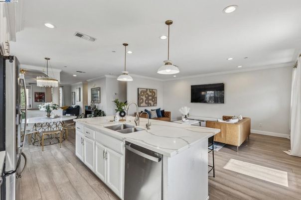 Chandelier, Dining room, Interior, Kitchen, Living room, Pendant Lights, Recessed Lighting, Wood Texture Flooring