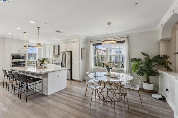 Dining room, Interior, Kitchen, Pendant Lights, Recessed Lighting, Stainless Steel Appliances, Wood Texture Flooring
