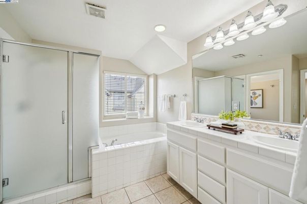 Bathroom, Dual Sink Vanities, Glass Shower, Interior, Recessed Lighting, Tile Countertops