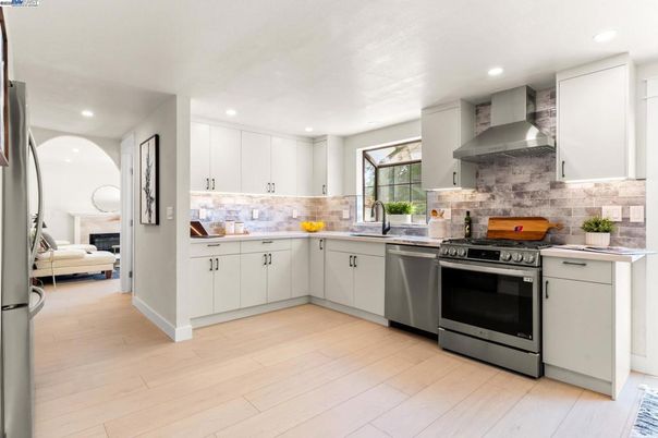 Interior, Kitchen, Recessed Lighting, Stainless Steel Appliances, Wood Texture Flooring