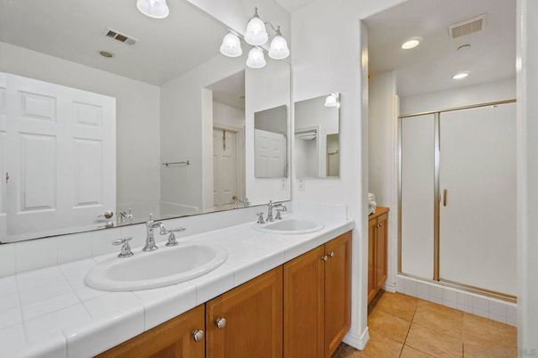 Bathroom, Dual Sink Vanities, Glass Shower, Interior, Recessed Lighting, Tile Countertops