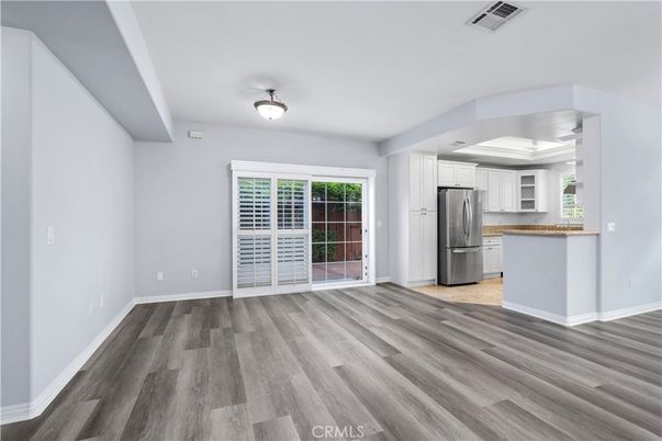 Empty room, Interior, Kitchen, Stainless Steel Appliances, Wood Texture Flooring