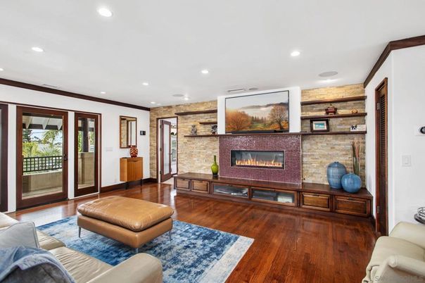 Fireplace, Interior, Living room, Recessed Lighting, Stone Walls, Wood Texture Flooring