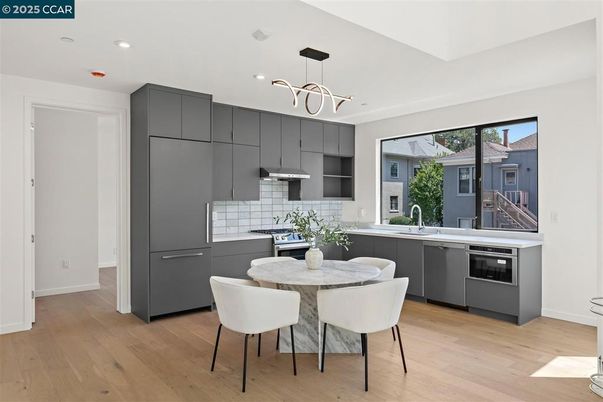 Dining room, Interior, Kitchen, Pendant Lights, Recessed Lighting, Stainless Steel Appliances, Wood Texture Flooring