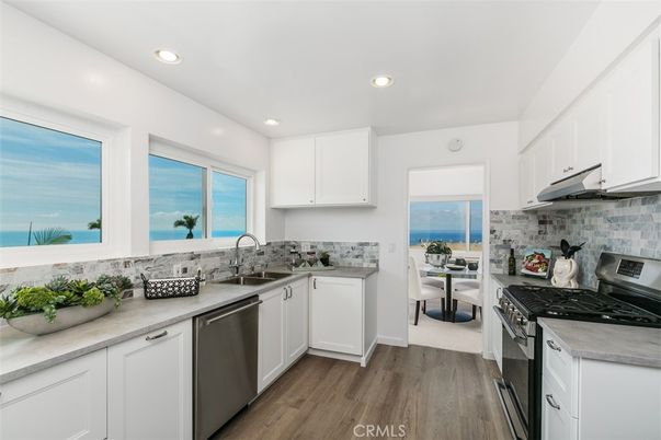 Interior, Kitchen, Recessed Lighting, Stainless Steel Appliances, Water, Wood Texture Flooring