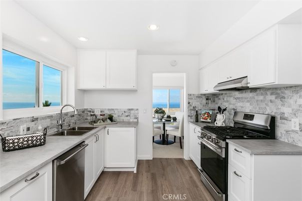 Interior, Kitchen, Recessed Lighting, Stainless Steel Appliances, Water, Wood Texture Flooring