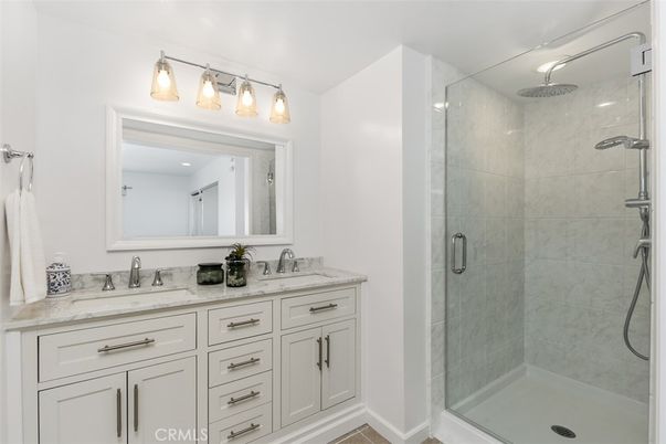 Bathroom, Dual Sink Vanities, Glass Shower, Interior, Marble Walls