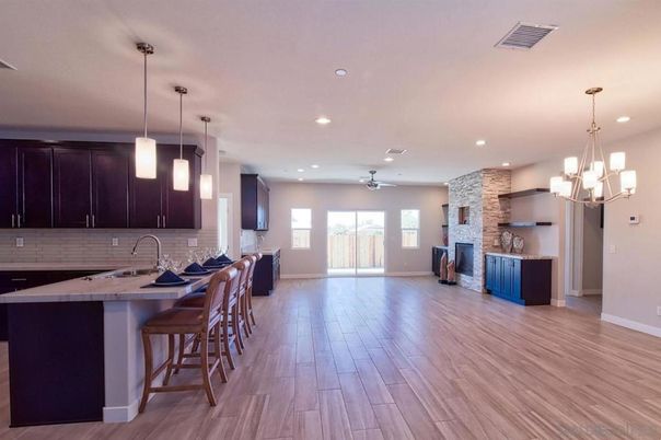 Fireplace, Interior, Kitchen, Pendant Lights, Recessed Lighting, Stone Walls, Wood Texture Flooring