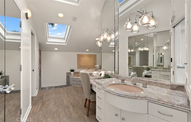 Bathroom, Dual Sink Vanities, Interior, Recessed Lighting, Wood Texture Flooring