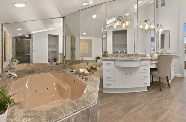 Bathroom, Dual Sink Vanities, Interior, Pendant Lights, Recessed Lighting, Wood Texture Flooring