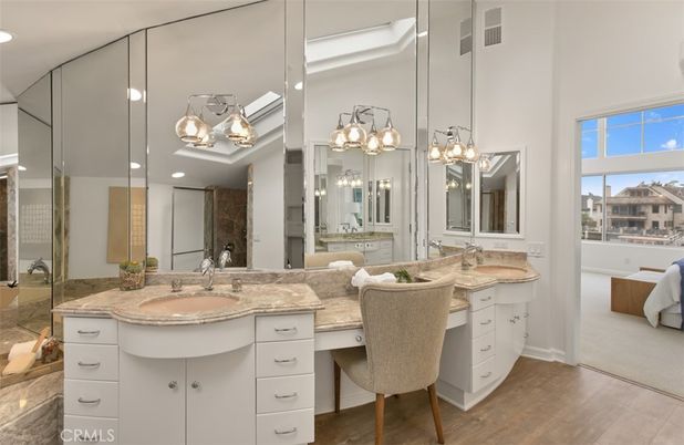 Bathroom, Dual Sink Vanities, Interior, Pendant Lights, Recessed Lighting, Wood Texture Flooring