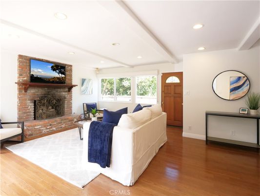 Fireplace, Interior, Living room, Recessed Lighting, Stone Walls, Wood Texture Flooring