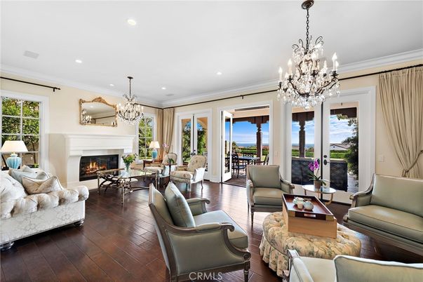 Chandelier, Fireplace, Interior, Living room, Recessed Lighting, Wood Texture Flooring
