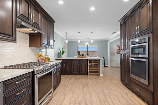 Interior, Kitchen, Pendant Lights, Recessed Lighting, Stainless Steel Appliances, Wood Texture Flooring