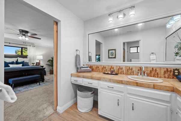 Bathroom, Bedroom, Dual Sink Vanities, Interior, Tile Countertops, Wood Texture Flooring