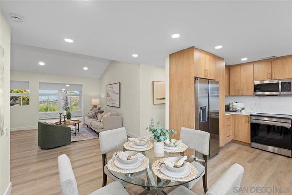 Dining room, Interior, Kitchen, Living room, Recessed Lighting, Stainless Steel Appliances, Wood Texture Flooring