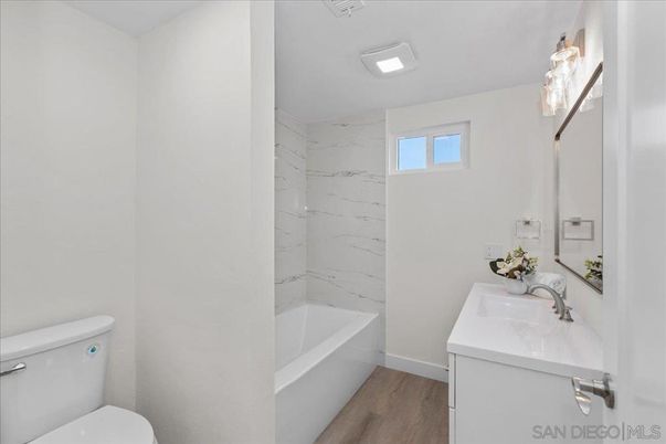 Bathroom, Interior, Marble Walls, Recessed Lighting, Wood Texture Flooring
