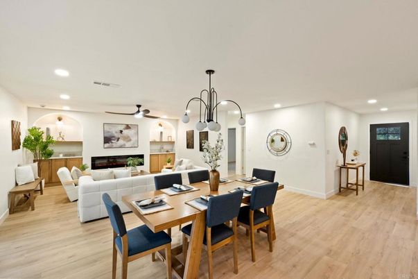 Dining room, Fireplace, Interior, Living room, Pendant Lights, Recessed Lighting, Wood Texture Flooring