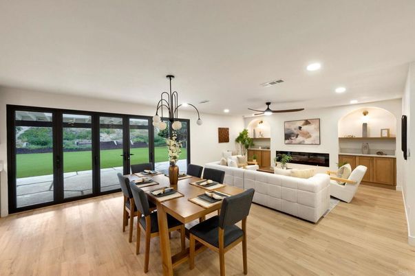 Dining room, Fireplace, Interior, Living room, Pendant Lights, Recessed Lighting, Wood Texture Flooring