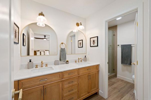 Bathroom, Dual Sink Vanities, Glass Shower, Interior, Wood Texture Flooring