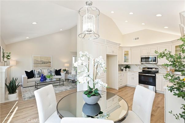 Dining room, Interior, Kitchen, Living room, Pendant Lights, Recessed Lighting, Stainless Steel Appliances, Wood Texture Flooring