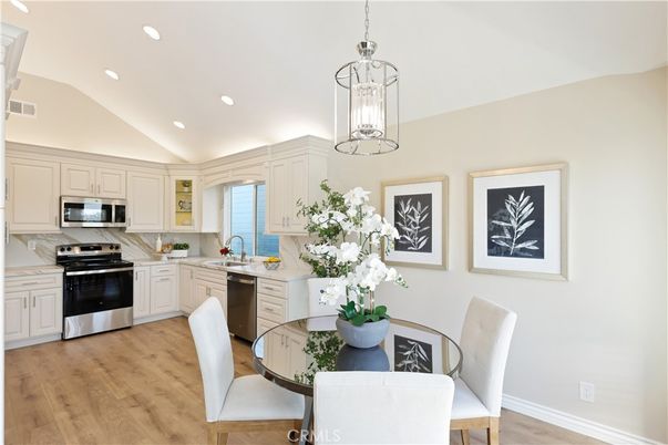Dining room, Interior, Kitchen, Pendant Lights, Recessed Lighting, Stainless Steel Appliances, Wood Texture Flooring