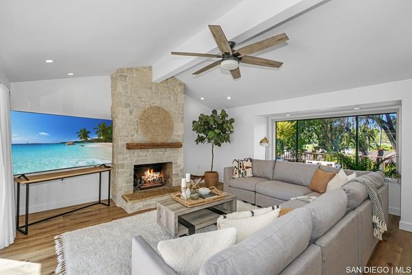 Fireplace, Interior, Living room, Recessed Lighting, Stone Walls, Wood Texture Flooring