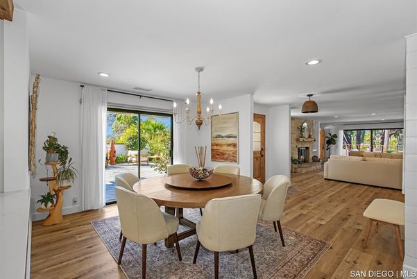 Dining room, Fireplace, Interior, Living room, Pendant Lights, Recessed Lighting, Wood Texture Flooring