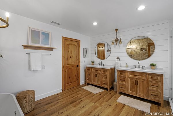 Bathroom, Dual Sink Vanities, Interior, Recessed Lighting, Wood Texture Flooring