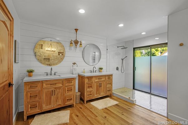 Bathroom, Dual Sink Vanities, Glass Shower, Interior, Recessed Lighting, Wood Texture Flooring
