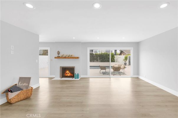 Empty room, Fireplace, Interior, Recessed Lighting, Wood Texture Flooring