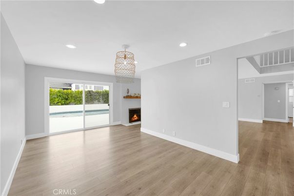 Empty room, Fireplace, Interior, Recessed Lighting, Wood Texture Flooring