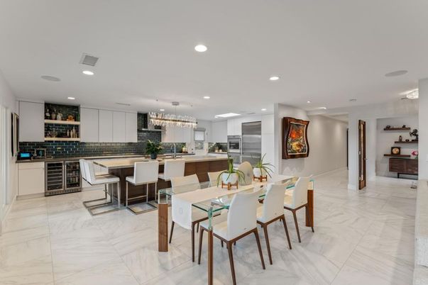 Chandelier, Dining room, Interior, Kitchen, Marble, Pendant Lights, Recessed Lighting, Stainless Steel Appliances