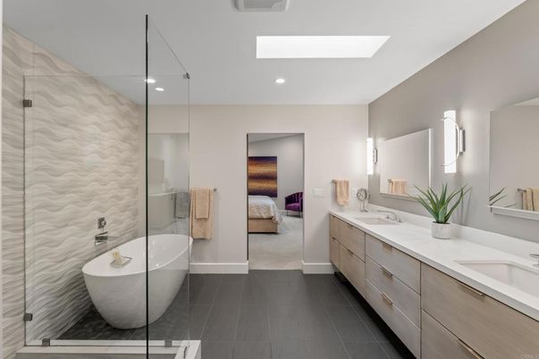 Bathroom, Dual Sink Vanities, Free Standing Baths, Glass Shower, Interior, Recessed Lighting, Wood Texture Flooring