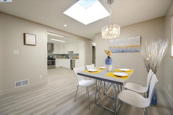 Dining room, Interior, Kitchen, Pendant Lights, Recessed Lighting, Stainless Steel Appliances, Wood Texture Flooring